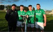 2 April 2022; Duffy brothers, from left, John, Ciarán, Caolan, and Barry celebrate with the cup after their side's victory in the Allianz Hurling League Division 3B Final match between Fermanagh and Longford at Avant Money Páirc Seán Mac Diarmada in Carrick-on-Shannon, Leitrim. Photo by Michael P Ryan/Sportsfile