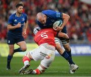 2 April 2022; Devin Toner of Leinster is tackled by Fineen Wycherley of Munster during the United Rugby Championship match between Munster and Leinster at Thomond Park in Limerick. Photo by Harry Murphy/Sportsfile