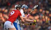 2 April 2022; Stephen Bennett of Waterford in action against Ger Millerick of Cork during the Allianz Hurling League Division 1 Final match between Cork and Waterford at FBD Semple Stadium in Thurles, Tipperary. Photo by Eóin Noonan/Sportsfile