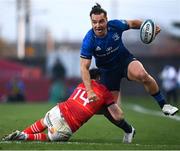 2 April 2022; James Lowe of Leinster is tackled by Calvin Nash of Munster during the United Rugby Championship match between Munster and Leinster at Thomond Park in Limerick. Photo by Harry Murphy/Sportsfile