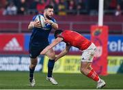2 April 2022; Robbie Henshaw of Leinster is tackled by Calvin Nash of Munster during the United Rugby Championship match between Munster and Leinster at Thomond Park in Limerick. Photo by Harry Murphy/Sportsfile