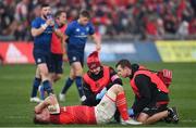 2 April 2022; Gavin Coombes of Munster receives treatment during the United Rugby Championship match between Munster and Leinster at Thomond Park in Limerick. Photo by Harry Murphy/Sportsfile