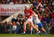 2 April 2022; Tim O’Mahony of Cork is tackled by Darragh Lyons of Waterford during the Allianz Hurling League Division 1 Final match between Cork and Waterford at FBD Semple Stadium in Thurles, Tipperary. Photo by Eóin Noonan/Sportsfile