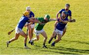2 April 2022; Daniel Teague of Fermanagh is tackled by Luca McCusker, left, and Keelan Cox of Longford during the Allianz Hurling League Division 3B Final match between Fermanagh and Longford at Avant Money Páirc Seán Mac Diarmada in Carrick-on-Shannon, Leitrim. Photo by Michael P Ryan/Sportsfile