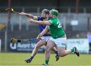2 April 2022; Enda Naughton of Longford in action against Shea Curran of Fermanagh during the Allianz Hurling League Division 3B Final match between Fermanagh and Longford at Avant Money Páirc Seán Mac Diarmada in Carrick-on-Shannon, Leitrim. Photo by Michael P Ryan/Sportsfile