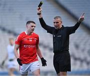 2 April 2022; Conall McKeever of Louth is shown the black card by referee Brendan Griffin during the Allianz Football League Division 3 Final match between Louth and Limerick at Croke Park in Dublin. Photo by Piaras Ó Mídheach/Sportsfile