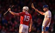 2 April 2022; Conor Prunty of Waterford keeps a close eye on Patrick Horgan of Cork as the sun sets in the distance during the Allianz Hurling League Division 1 Final match between Cork and Waterford at FBD Semple Stadium in Thurles, Tipperary. Photo by Ray McManus/Sportsfile