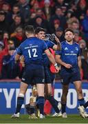 2 April 2022; Jimmy O'Brien of Leinster, centre, celebrates after scoring his side's third try with teammates Robbie Henshaw and Hugo Keenan during the United Rugby Championship match between Munster and Leinster at Thomond Park in Limerick. Photo by Harry Murphy/Sportsfile