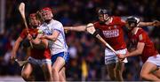 2 April 2022; Carthach Daly of Waterford is tackled by Darragh Fitzgibbon, left, and Ger Millerick of Cork during the Allianz Hurling League Division 1 Final match between Cork and Waterford at FBD Semple Stadium in Thurles, Tipperary. Photo by Ray McManus/Sportsfile