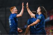 2 April 2022; James Lowe of Leinster celebrates after scoring his side's fourth try with teammate Ciarán Frawley during the United Rugby Championship match between Munster and Leinster at Thomond Park in Limerick. Photo by Harry Murphy/Sportsfile