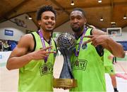 2 April 2022; Garveys Tralee Warriors players Brandon Cotton, left, and Aaron Calixte celebrate with the Superleague trophy after the InsureMyVan.ie SuperLeague Final match between Garvey’s Tralee Warriors, Kerry and C&S Neptune, Cork, at the National Basketball Arena in Dublin. Photo by Brendan Moran/Sportsfile