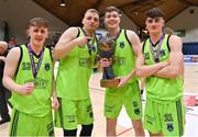 2 April 2022; Garvey's Tralee Warriors players, from left,James Fernane, Ronalds Elksnis, Keelan Crowe and Steven Bowler celebrate with the Superleague trophy after the InsureMyVan.ie SuperLeague Final match between Garvey’s Tralee Warriors, Kerry and C&S Neptune, Cork, at the National Basketball Arena in Dublin. Photo by Brendan Moran/Sportsfile