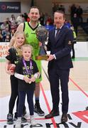 2 April 2022; Garvey's Tralee Warrions captain Fergal O'Sullivan, with his daughters Ava and Fiadh, is presented with the Superleague trophy by Basketball Ireland MNCC member Paul Barrett after the InsureMyVan.ie SuperLeague Final match between Garvey’s Tralee Warriors, Kerry and C&S Neptune, Cork, at the National Basketball Arena in Dublin. Photo by Brendan Moran/Sportsfile