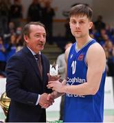 2 April 2022; Roy Downey of Coughlan C&S Neptune is presented with his Men's Superleague Allstar award by  Basketball Ireland MNCC member Paul Barrett after the InsureMyVan.ie SuperLeague Final match between Garvey’s Tralee Warriors, Kerry and C&S Neptune, Cork, at the National Basketball Arena in Dublin. Photo by Brendan Moran/Sportsfile