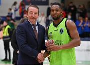 2 April 2022; Aaron Calixte of Garvey's Tralee Warriors is presented with his Men's Superleague Allstar award by  Basketball Ireland MNCC member Paul Barrett after the InsureMyVan.ie SuperLeague Final match between Garvey’s Tralee Warriors, Kerry and C&S Neptune, Cork, at the National Basketball Arena in Dublin. Photo by Brendan Moran/Sportsfile