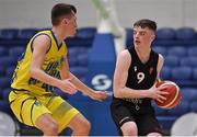 3 April 2022; Sean O'Flynn of Quish's Ballincollig in action against Conor Walsh of UCD Marian during the InsureMyVan.ie U20 Men’s National League Final match between Quish's Ballincollig, Cork and UCD Marian, Dublin at the National Basketball Arena in Dublin. Photo by Brendan Moran/Sportsfile
