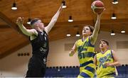 3 April 2022; Eoin Fitzgerald of UCD Marian in action against Sean O'Flynn of Quish's Ballincollig during the InsureMyVan.ie U20 Men’s National League Final match between Quish's Ballincollig, Cork and UCD Marian, Dublin at the National Basketball Arena in Dublin. Photo by Brendan Moran/Sportsfile