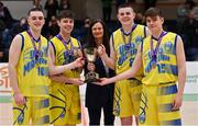 3 April 2022; UCD Marian joint captains, from left, Ronan Byrne, Brian O'Hara Duggan, Luke Gilleran and Paraic Moran are presented with the cup by Basketball Ireland board member Dolores Geaney after the InsureMyVan.ie U20 Men’s National League Final match between Quish's Ballincollig, Cork and UCD Marian, Dublin at the National Basketball Arena in Dublin. Photo by Brendan Moran/Sportsfile