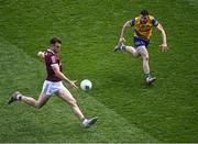 3 April 2022; Paul Conroy of Galway scores a point under pressure from Ciaráin Murtagh of Roscommon during the Allianz Football League Division 2 Final match between Roscommon and Galway at Croke Park in Dublin. Photo by Piaras Ó Mídheach/Sportsfile