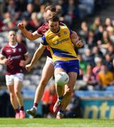 3 April 2022; Ultan Harney of Roscommon is tackled by Paul Conroy of Galway as he has a shot on goal during the Allianz Football League Division 2 Final match between Roscommon and Galway at Croke Park in Dublin. Photo by Ray McManus/Sportsfile