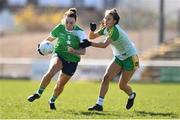 3 April 2022; Cathy Mee of Limerick in action against Róisín Ennis of Offaly during the Lidl Ladies Football National League Division 4 Final match between Limerick and Offaly at St Brendan's Park in Birr, Offaly. Photo by Ben McShane/Sportsfile