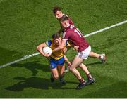 3 April 2022; Conor Cox of Roscommon in action against Niall Daly, 11, and Paul Conroy of Galway during the Allianz Football League Division 2 Final match between Roscommon and Galway at Croke Park in Dublin. Photo by Piaras Ó Mídheach/Sportsfile