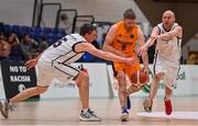 3 April 2022; Rody McEvoy of Midland Masters in action against Paddy Kelly, left, and Ian Durham of Dublin Vikings during the InsureMyHouse.ie Masters Over 40’s Men National Cup Final match between Midlands Masters, Laois and Dublin Vikings at the National Basketball Arena in Dublin. Photo by Brendan Moran/Sportsfile