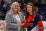 2 April 2022; Edel Thornton of Singleton SuperValu Brunell  is presented with her Women's Superleague Allstar award by Basketball Ireland WNLC chairperson Breda Dick after the MissQuote.ie Champions Trophy Final match between The Address UCC Glanmire, Cork and Singleton SuperValu Brunell, Cork, at the National Basketball Arena in Dublin. Photo by Brendan Moran/Sportsfile