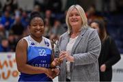 2 April 2022; Carrie Shepard of The Address UCC Glanmire is presented with her Women's Superleague Allstar award by Basketball Ireland WNLC chairperson Breda Dick after the MissQuote.ie Champions Trophy Final match between The Address UCC Glanmire, Cork and Singleton SuperValu Brunell, Cork, at the National Basketball Arena in Dublin. Photo by Brendan Moran/Sportsfile