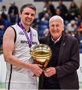 3 April 2022; Paddy Kelly of Dublin Vikings is presented with the MVP by Basketball Ireland board member Tony Bruke after the InsureMyHouse.ie Masters Over 40’s Men National Cup Final match between Midlands Masters, Laois and Dublin Vikings at the National Basketball Arena in Dublin. Photo by Brendan Moran/Sportsfile