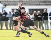 3 April 2022; Laurence Steen of Dundalk is tackled by Liam Phelan of Kilkenny during the Bank of Ireland Leinster Rugby Provincial Towns Cup Semi-Final match between Dundalk and Kilkenny at Naas RFC in Naas, Kildare. Photo by David Fitzgerald/Sportsfile