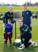 7 April 2022; The Football Association of Ireland and DHL Express Ireland, official logistics partner to the FAI, have come together to offer unique football experiences to young Irish fans suffering with illness, injury or incapacitation, using the new FAI BEAM Robot sponsored by DHL. At the launch of the experience are Republic of Ireland players, from left, Caoimhin Kelleher, James Talbot and Dara O'Shea with Simon Smith, from Swords, Dublin, at the FAI National Training Centre in Abbotstown, Dublin. Photo by Stephen McCarthy/Sportsfile