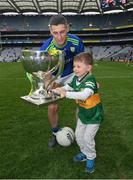 3 April 2022; Five year old Paidi lifts the cup with his father Paul Geaney of Kerry after the Allianz Football League Division 1 Final match between Kerry and Mayo at Croke Park in Dublin. Photo by Ray McManus/Sportsfile
