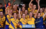 3 April 2022; Roscommon captain Laura Fleming lifts the cup alongside her teammates after the Lidl Ladies Football National League Division 3 Final match between Roscommon and Wexford at St Brendan's Park in Birr, Offaly. Photo by Ben McShane/Sportsfile