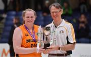 3 April 2022; Midland Masters captain Anna Reddin is presented with the cup by Basketball Ireland masters committee member Paul Gallen after the InsureMyHouse.ie Masters Over 40’s Women National Cup Final match between Glanmire, Cork and Midlands Masters, Laois at the National Basketball Arena in Dublin. Photo by Brendan Moran/Sportsfile