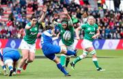 2 April 2022; Laure Sansus of France kicks the ball under pressure from Katie O'Dwyer and Nichola Fryday of Ireland during the TikTok Women's Six Nations Rugby Championship match between France and Ireland at Stade Ernest Wallon in Toulouse, France. Photo by Manuel Blondeau/Sportsfile