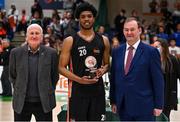 2 April 2022; Keith Jordan Jr of EJ Sligo All-Stars is presented with his Men's Division 1 Allstar award by Basketball Ireland board member Tony Burke, left, and Basketball Ireland chief executive John Feehan after the InsureMyVan.ie Division 1 Final match between EJ Sligo All-Stars and UCC Demons, Cork at the National Basketball Arena in Dublin. Photo by Brendan Moran/Sportsfile