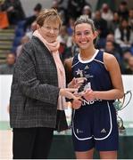 2 April 2022; Lexi Posset of Ulster University is presented with the her Women's Division 1 Allstar award by Basketball Ireland WNLC member Annette O'Toole after the MissQuote.ie Division 1 League Cup Final match between NUIG Mystics, Galway and Ulster University, Antrim, at the National Basketball Arena in Dublin. Photo by Brendan Moran/Sportsfile