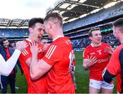 2 April 2022; Louth players John Clutterbuck, left, and Ciarán Byrne celebrate after their side's victory in the Allianz Football League Division 3 Final match between Louth and Limerick at Croke Park in Dublin. Photo by Piaras Ó Mídheach/Sportsfile