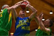 1 April 2022; Eugene Walsh of UCD Lions in action against Cormac O'Donoghue, left, and John Teahan of Killarney Cougars during the InsureMyHouse.ie Masters Over 50’s Men National Cup Final match between Killarney Cougars and UCD Lions at the National Basketball Arena in Dublin. Photo by Sam Barnes/Sportsfile
