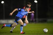 4 April 2022; Liam Kerrigan of UCD in action against Cameron McJannet of Derry City during the SSE Airtricity League Premier Division match between UCD and Derry City at UCD Bowl in Dublin. Photo by Ramsey Cardy/Sportsfile
