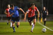 4 April 2022; Matty Smith of Derry City in action against Michael Gallagher of UCD during the SSE Airtricity League Premier Division match between UCD and Derry City at UCD Bowl in Dublin. Photo by Ramsey Cardy/Sportsfile
