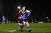 4 April 2022; Michael Gallagher of UCD in action against Cameron McJannet of Derry City during the SSE Airtricity League Premier Division match between UCD and Derry City at UCD Bowl in Dublin. Photo by Ramsey Cardy/Sportsfile