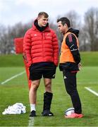 5 April 2022; Gavin Coombes in conversation with head coach Johann van Graan during Munster rugby squad training at University of Limerick in Limerick. Photo by Piaras Ó Mídheach/Sportsfile