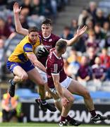 3 April 2022; Eddie Nolan of Roscommon is tackled by Matthew Tierney and Liam Silke, right, of Galway during the Allianz Football League Division 2 Final match between Roscommon and Galway at Croke Park in Dublin. Photo by Ray McManus/Sportsfile