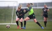 5 April 2022; Amber Barrett is tackled by Louise Quinn during a Republic of Ireland Women training session at the FAI National Training Centre in Abbotstown, Dublin. Photo by Stephen McCarthy/Sportsfile