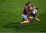 3 April 2022; Ultan Harney of Roscommon in action against Galway players Seán Kelly and Dessie Conneely, behind, during the Allianz Football League Division 2 Final match between Roscommon and Galway at Croke Park in Dublin. Photo by Piaras Ó Mídheach/Sportsfile