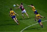 3 April 2022; Finnian Ó Laoí of Galway in action against Roscommon players, from left, Ultan Harney, David Murray, and Donie Smith during the Allianz Football League Division 2 Final match between Roscommon and Galway at Croke Park in Dublin. Photo by Piaras Ó Mídheach/Sportsfile