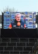2 April 2022; Cork manager Kieran Kingston is seen on the new trial scoreboard as he is interviewed for TG4 before the Allianz Hurling League Division 1 Final match between Cork and Waterford at FBD Semple Stadium in Thurles, Tipperary. Photo by Ray McManus/Sportsfile