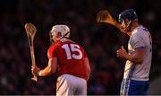 do your best to keep the background as dark as possible please          2 April 2022; Conor Prunty of Waterford and Patrick Horgan of Cork keep a close eye on the play as the as the sun sets in the distance during the Allianz Hurling League Division 1 Final match between Cork and Waterford at FBD Semple Stadium in Thurles, Tipperary. Photo by Ray McManus/Sportsfile